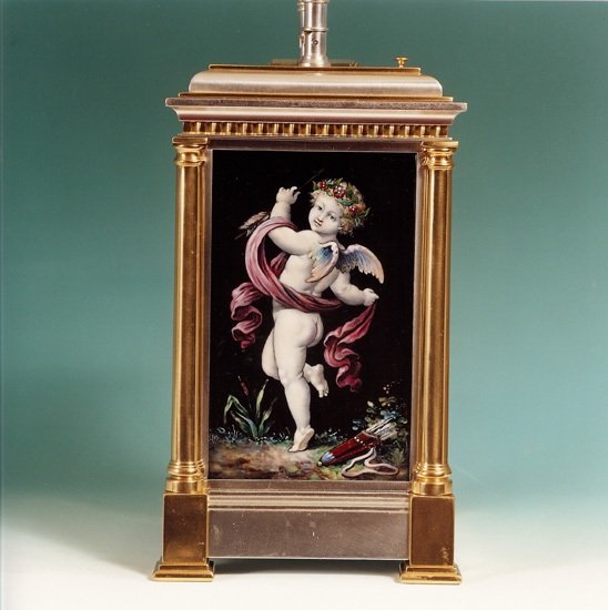 Giant grande sonnerie carriage clock with Limoges panels.  