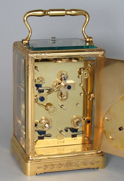 Early carriage clock with unusual escapement.
