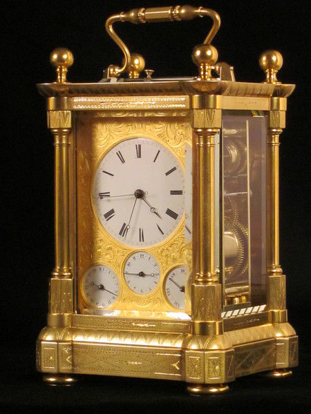 Rare fully engraved early musical carriage clock with day, date and alarm