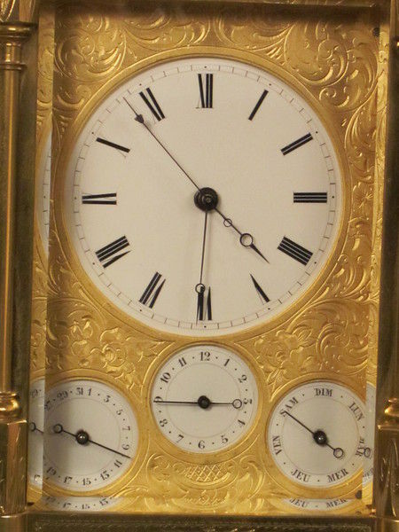 Rare fully engraved early musical carriage clock with day, date and alarm