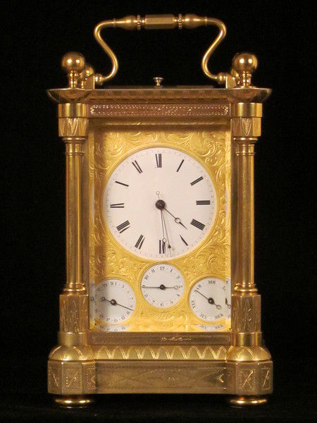 Rare fully engraved early musical carriage clock with day, date and alarm