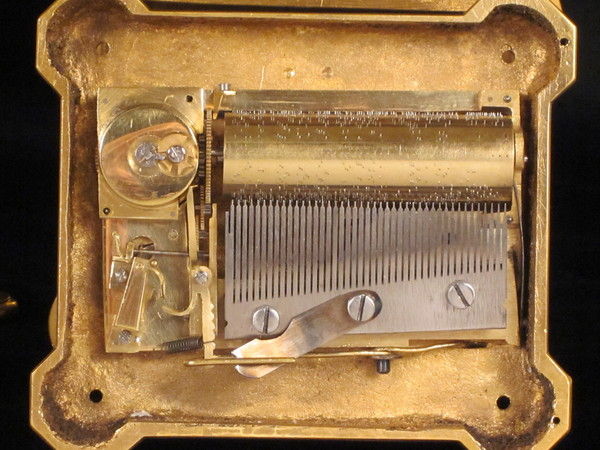 Rare fully engraved early musical carriage clock with day, date and alarm