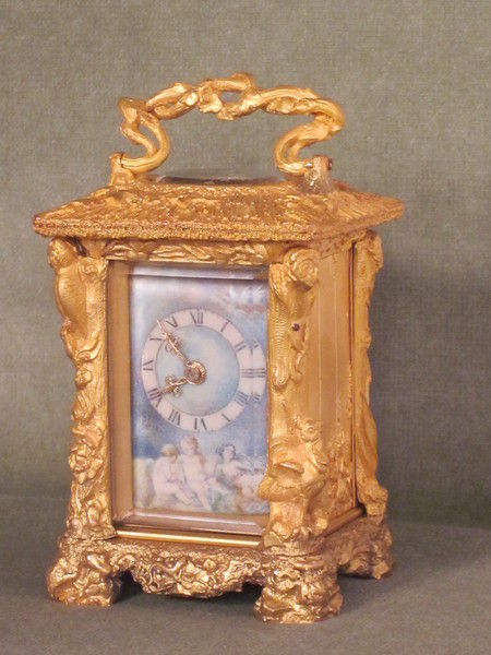 Unique? miniature carriage clock in the form of a country cottage.