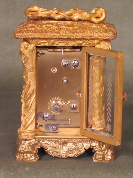 Unique? miniature carriage clock in the form of a country cottage.