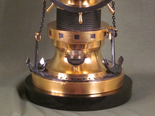 complex maritime industrial clock by Guilmet with moving ships wheels.