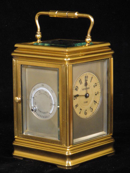 clock with dials on four sides indicating time in London,Paris, New York