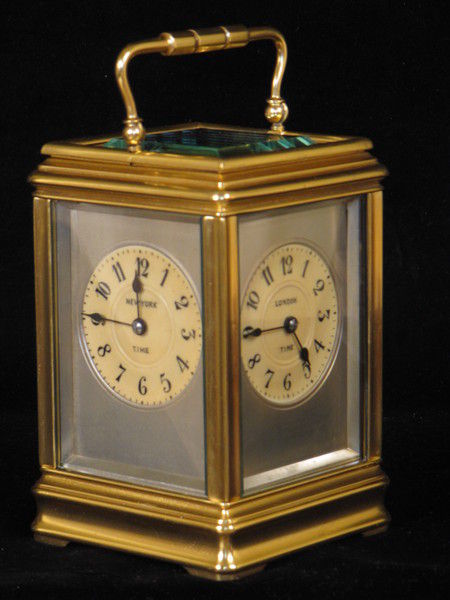 clock with dials on four sides indicating time in London,Paris, New York