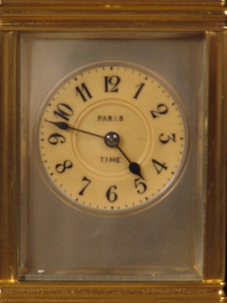 clock with dials on four sides indicating time in London,Paris, New York