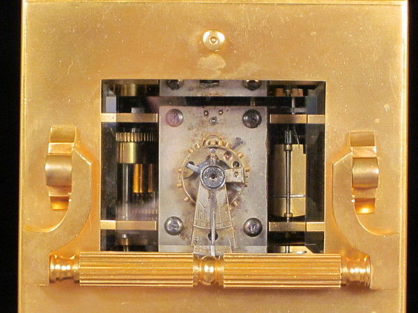 Petite sonnerie carriage clock with fretted out, engraved and gilded panels