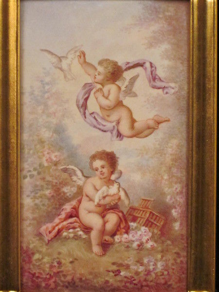 An extremely fine enamel panelled carriage clock with original box.