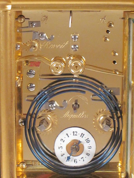 An extremely fine enamel panelled carriage clock with original box.