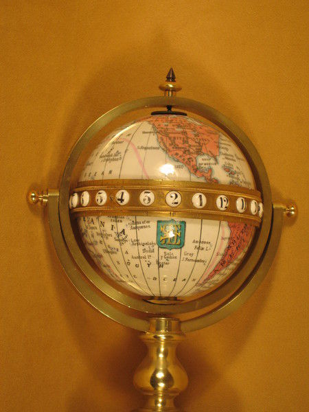Redier rotating enamelled globe clock indicating time world-wide. circa 1880