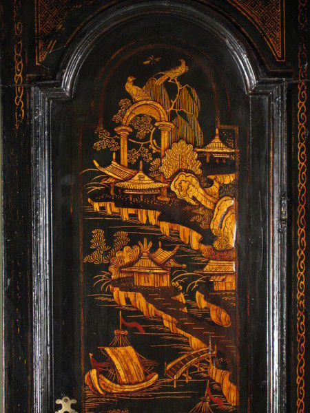 fine green lacquer longcase showing high water and phases of the moon.