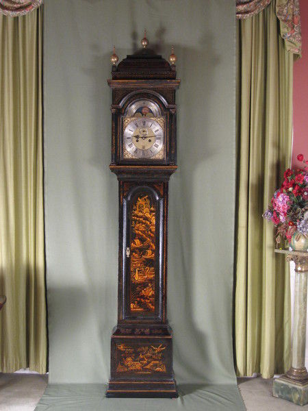 fine green lacquer longcase showing high water and phases of the moon.