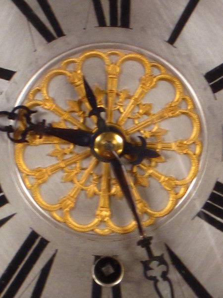 rare automaton clock with wizard striking the quarters on four bells