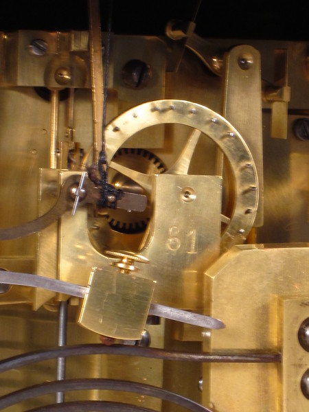 rare automaton clock with wizard striking the quarters on four bells