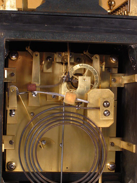 rare automaton clock with wizard striking the quarters on four bells