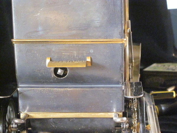 A rare automaton car clock by Guilmet, 