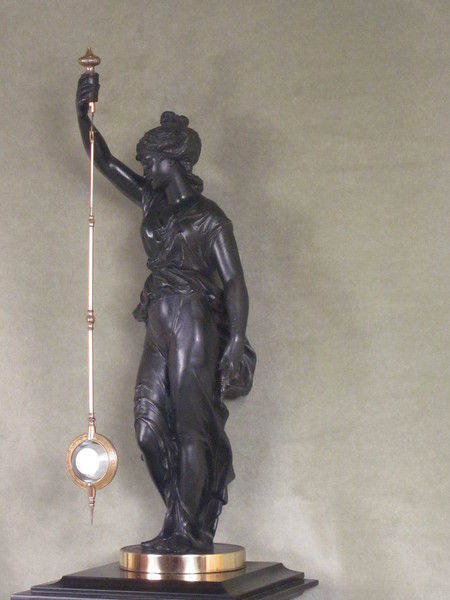 Guilmet mystery clock with pendulum swinging without any obvious impulse