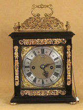 Nathaniel Hodges, A small 17th cent table clock with oak carrying case.