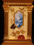 Miniature porcelain panelled carriage clock (France)