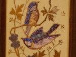 Panelled cc, with birds and butterflies enhanced by tiny glass beads.  (France)