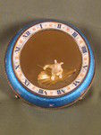 Silver and enamel novelty clock with rotating figure to show the time.     (Switzerland)