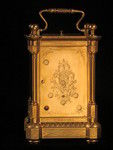 Rare fully engraved early musical carriage clock with day, date and alarm (France)