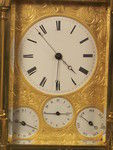 Rare fully engraved early musical carriage clock with day, date and alarm (France)