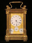Rare fully engraved early musical carriage clock with day, date and alarm (France)