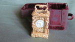Miniature carriage clock with carytids, engraved panels and original case.   (France)