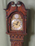  Miniature weight driven mahogany longcase clock. (Grandmother clock) (England)