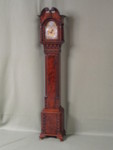  Miniature weight driven mahogany longcase clock. (Grandmother clock) (England)